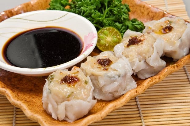 Dimsum (siomai) with soy sauce on the side Dim Sum