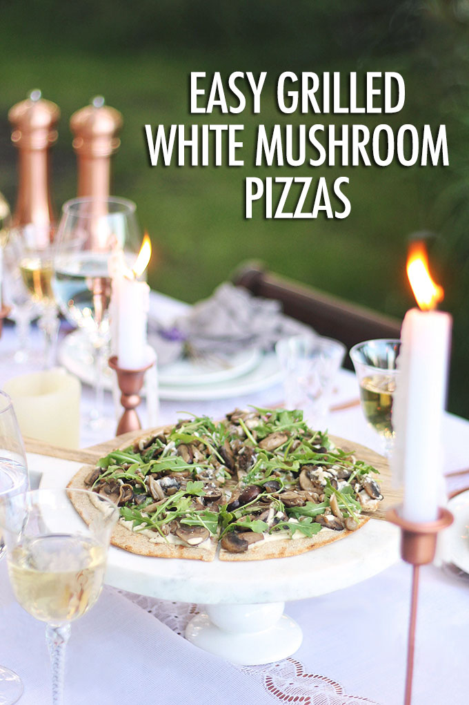 Grilled mushroom pizzas on a picnic table