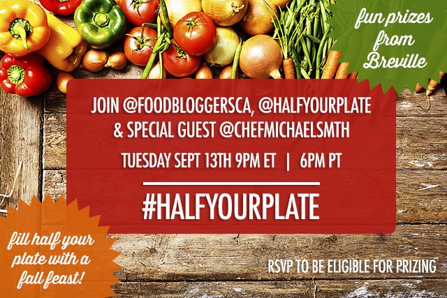 Farm-fresh carrots and other vegetables form a top-edge border on weathered wooden planks. Plenty of copy space on the wood.