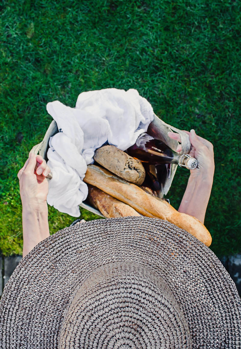woman carrying a picnic basket