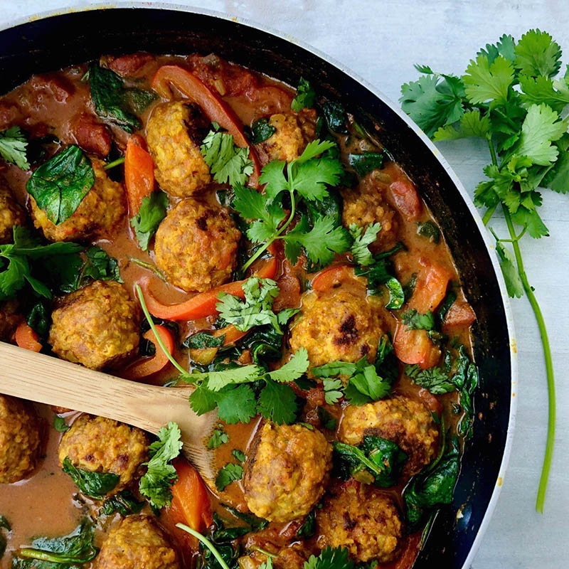 Turkey Meatballs in Coconut Curry with Spinach and Peppers