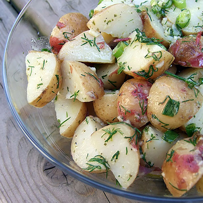 Herbed Potato Salad in a glass bowl