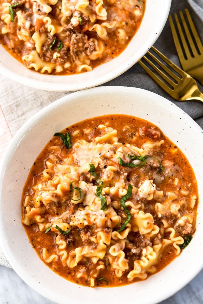 Two bowls of lazy lasagna (noodles and sauce)