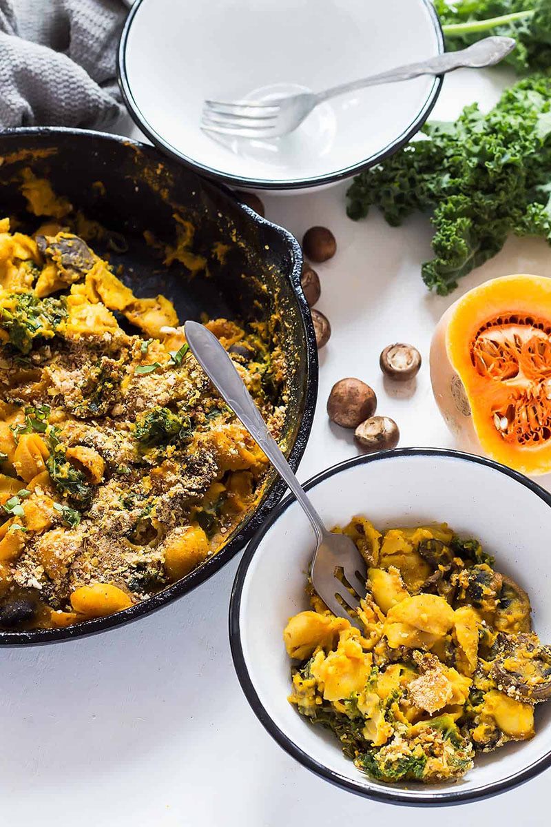 A bowl of vegan pasta bake with a fork