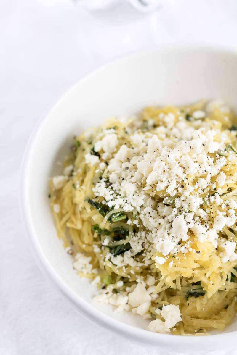 Spaghetti squash in a bowl with feta and kale