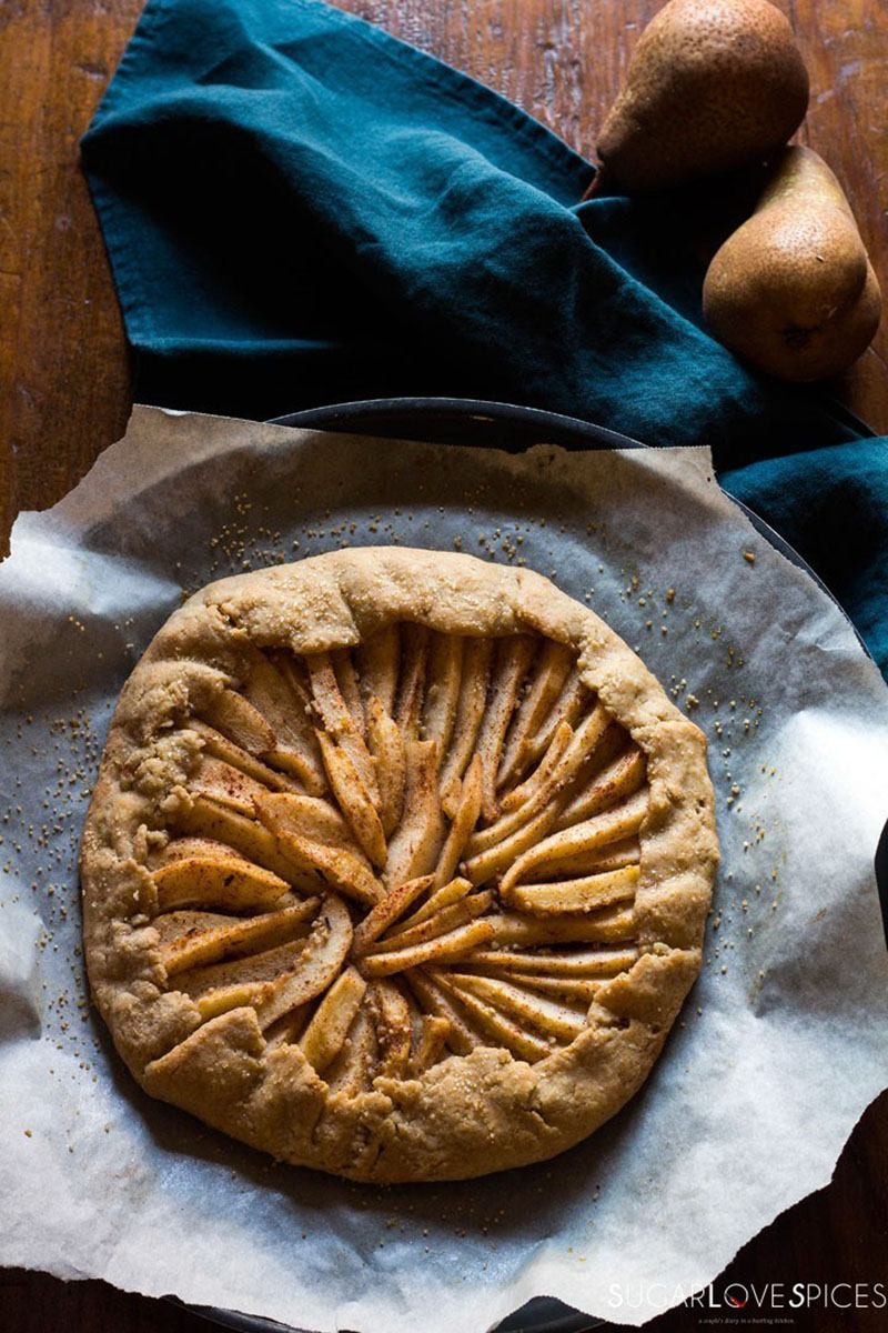rustic pear galette on parchment paper