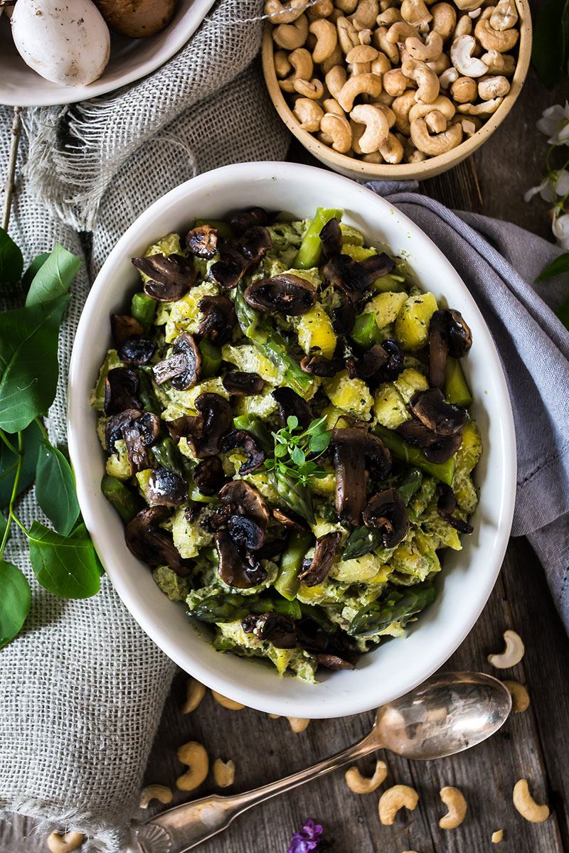 overhead photo of a vibrant green pasta primavera bake