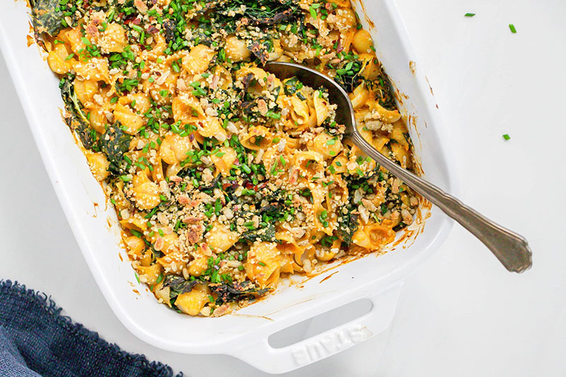 An overhead photo of a casserole dish of vegan chipotle mac and cheese