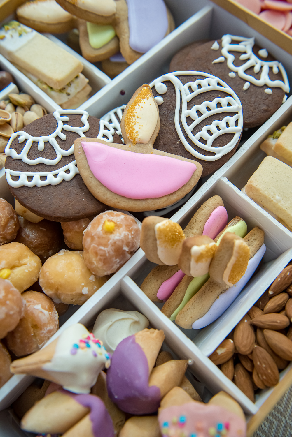 bento box of diwali cookies and Indian sweets