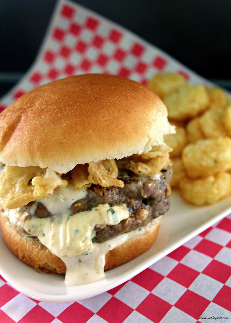 Garlic burger on a plate with fries