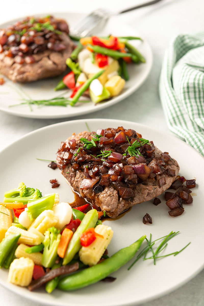 Chaliapin steak on a plate with mixed veggies