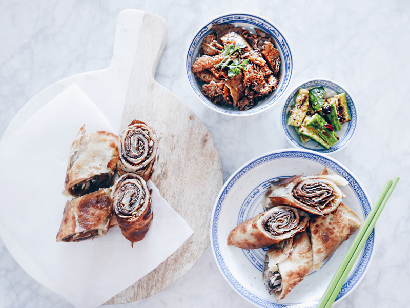 green onion pancake beef rolls cut in sections.
