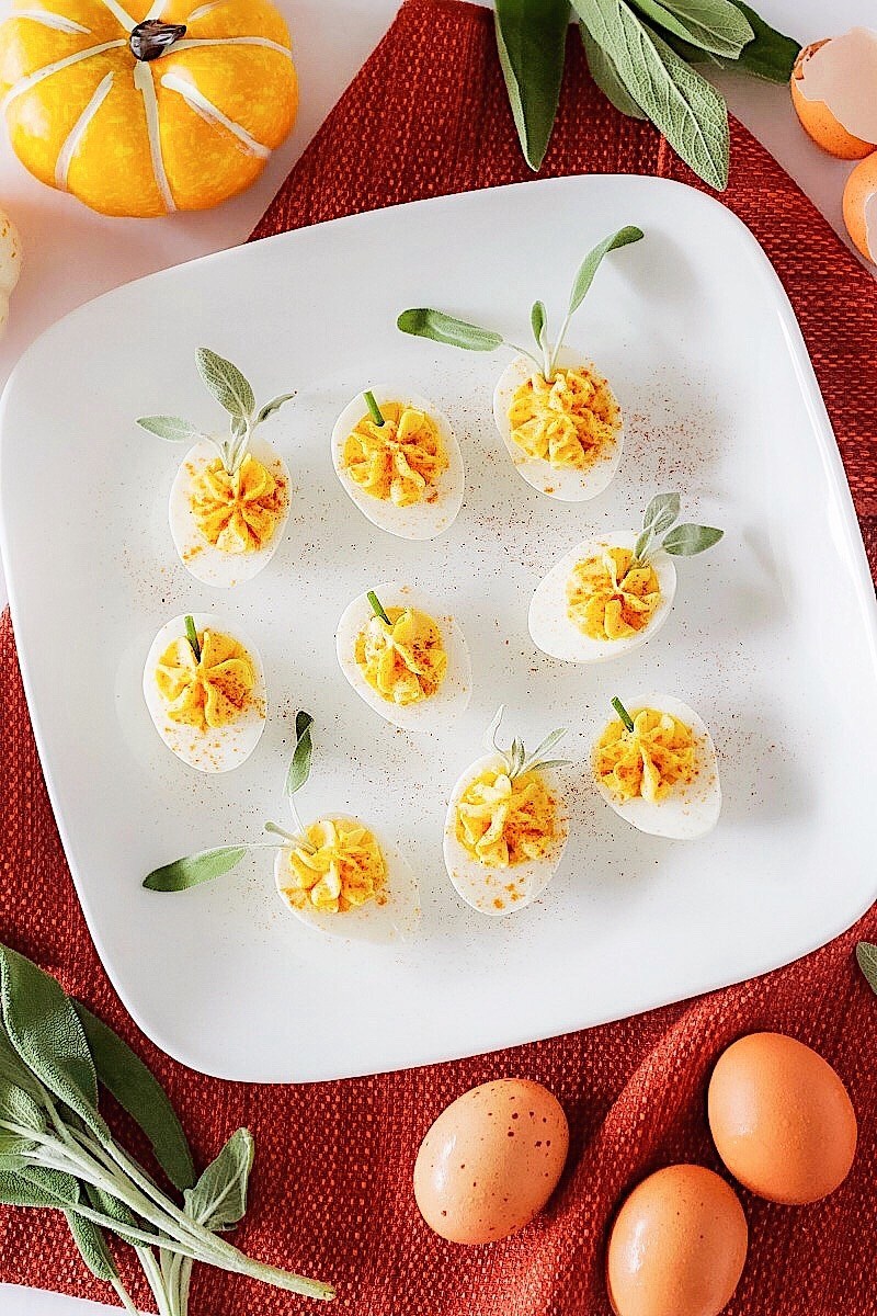 A plate of pumpkin patch deviled eggs