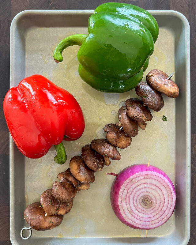 Red bell pepper, green red pepper, mushrooms, red onion.