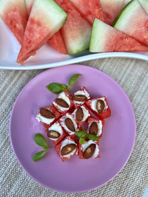 Watermelon bites with almonds and cream cheese