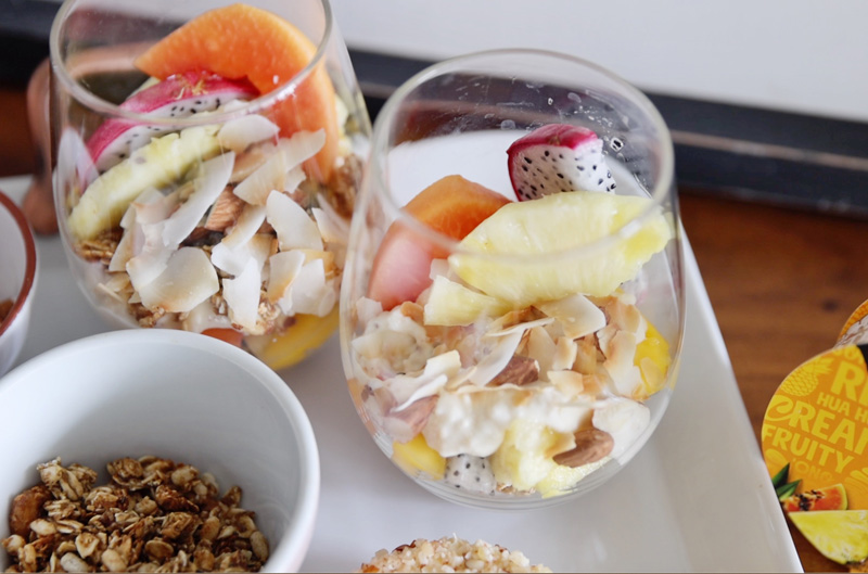 Hawaiian sunrsie with coconut milk and cream cheese in a glass.