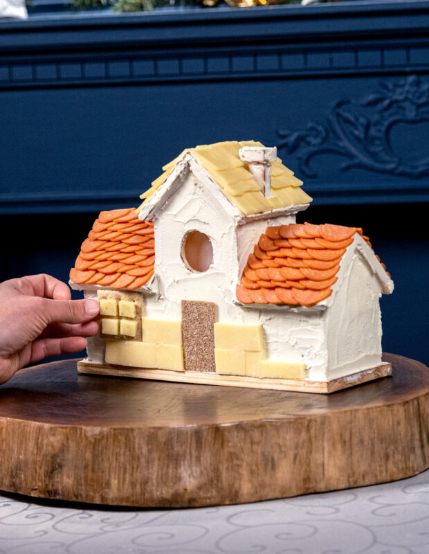 Charcuterie house with pepperoni and cheese.