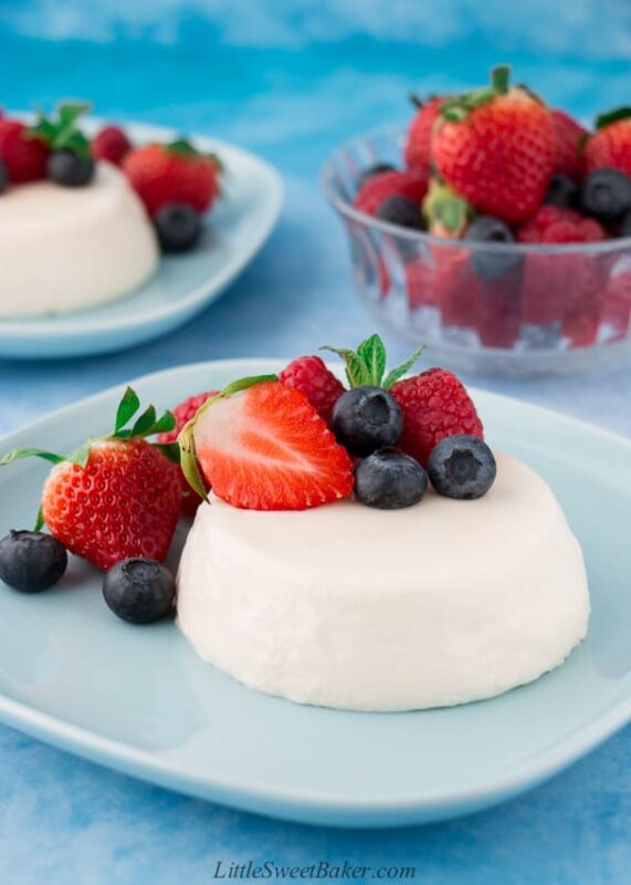 Panna cotta with blueberries and strawberries.