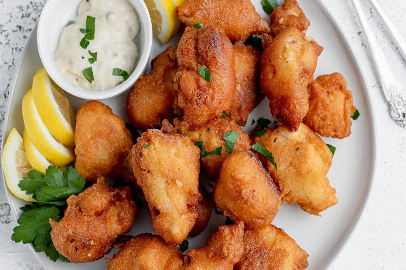 Pancake battered fried fish.